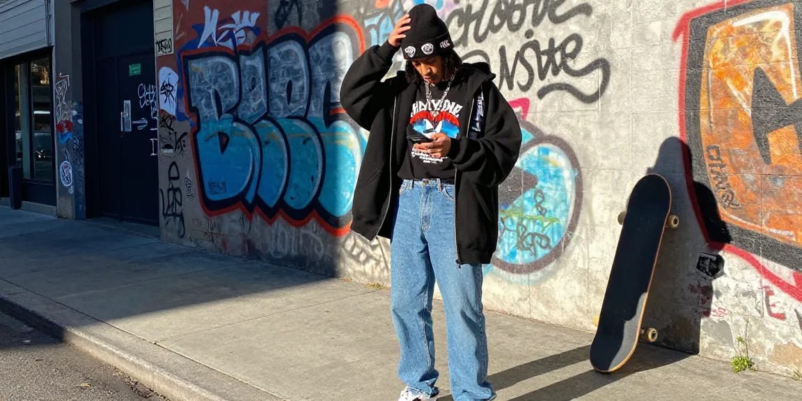Model showcasing stylish Chrome Hearts streetwear in urban setting